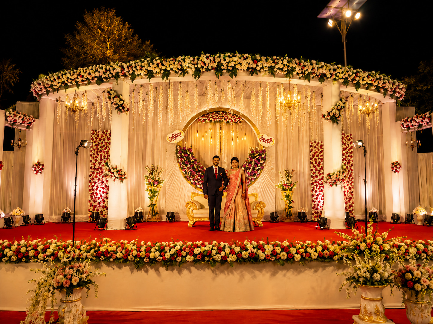 Lavish Purple-Lit Wedding Stage at Night
