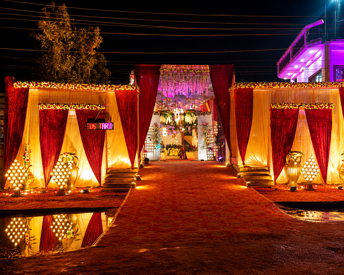 Grand Floral Wedding Entrance at Night