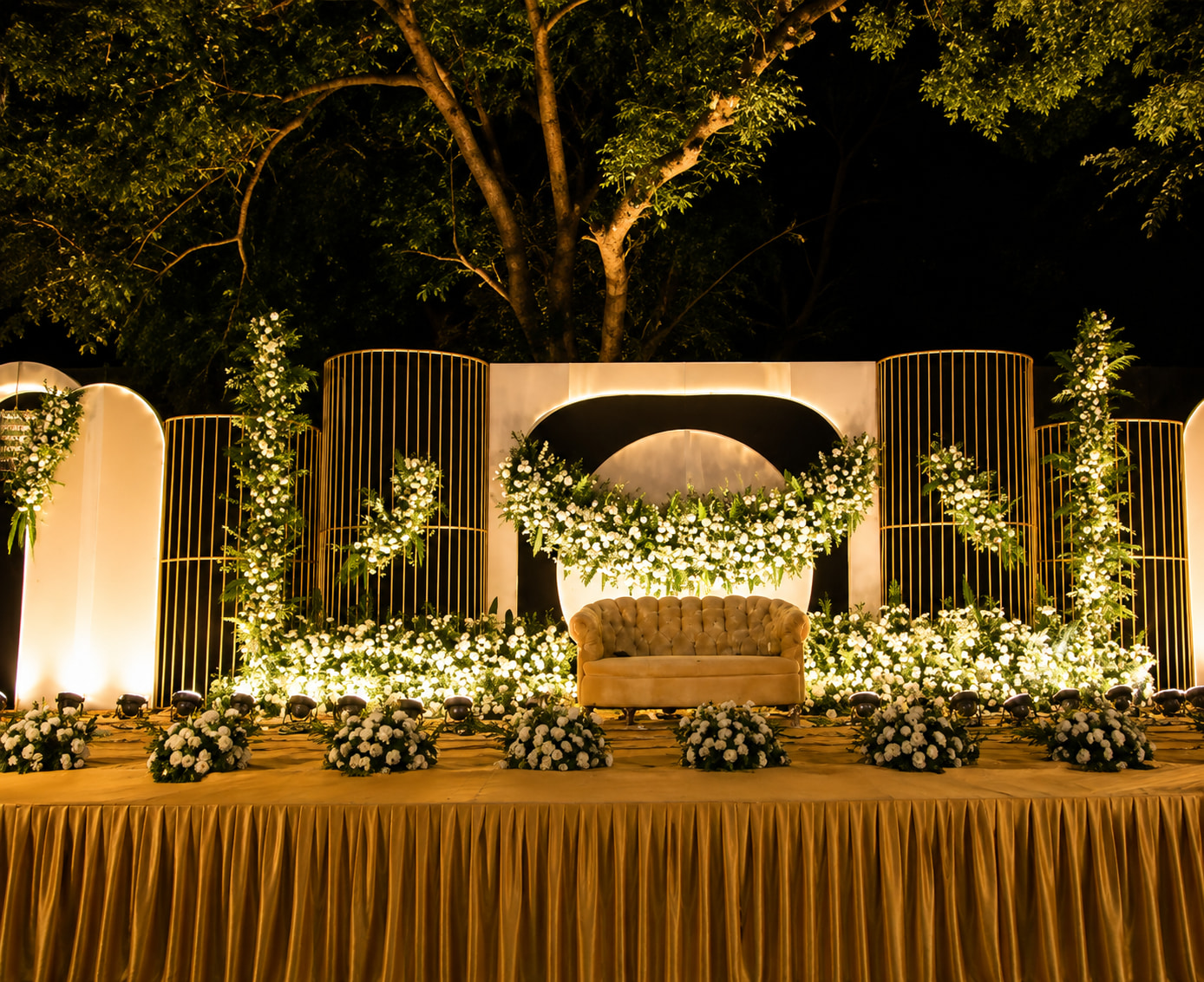 Luxurious Golden Wedding Stage beneath Trees
